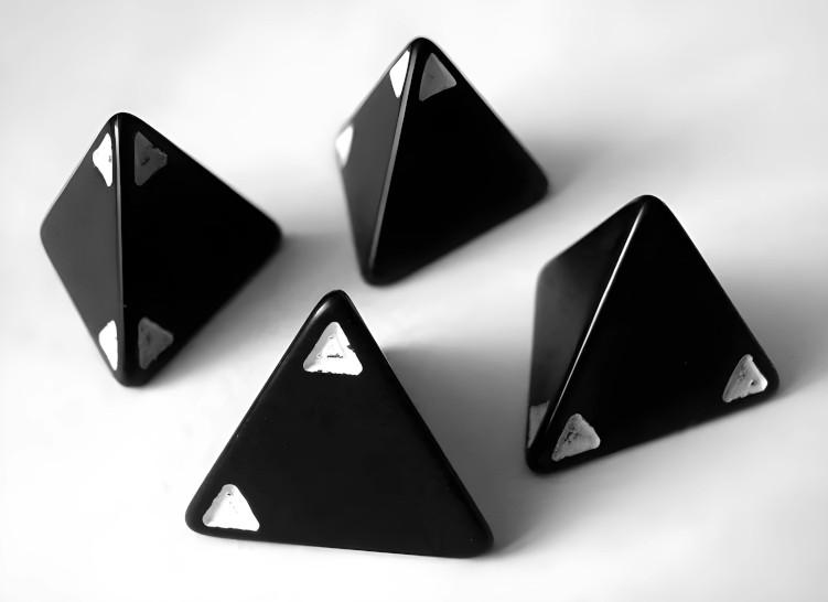 A photo of the unique tetrahedral dice used for the Royal Game of Ur.